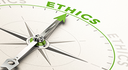 Compass needle pointing to the word Ethics