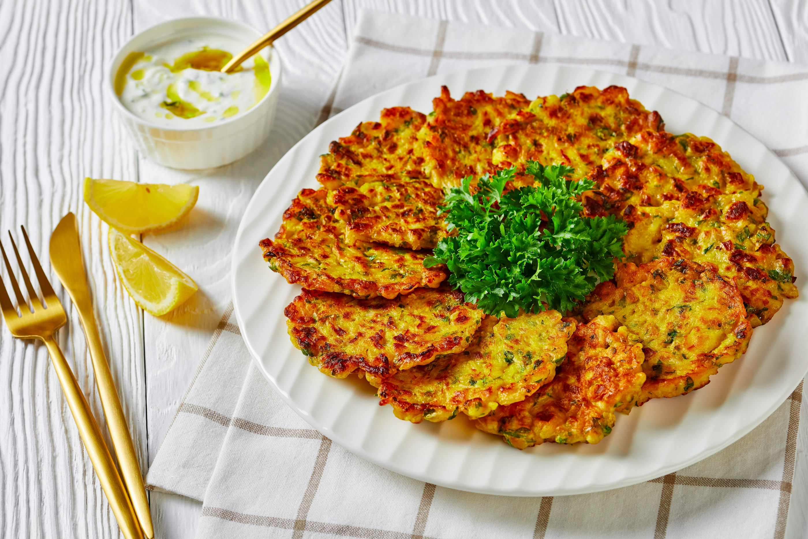 Plate of leek patties on a tablescape