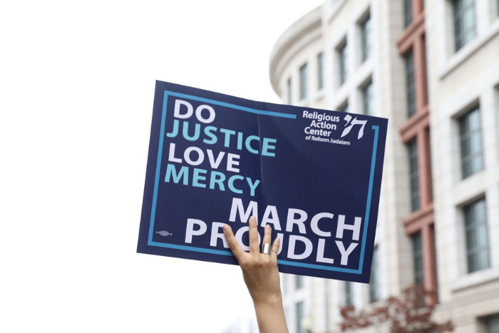 Do Justice, Love Mercy, March Proudly Sign