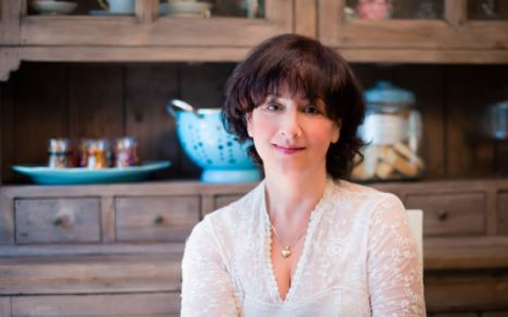 Headshot of cookbook author Marcy Goldman in a kitchen setting