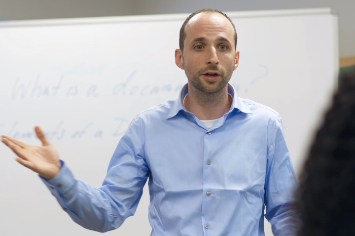 Hanan Harchol teaching in front of a class