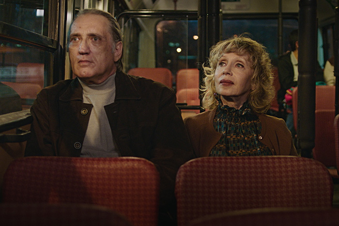A scene from the film Golden Voices - VIctor and Raya on a bus