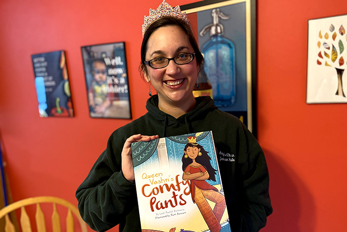 Rabbi Leah R. Berkowitz holding book Queen Vashti’s Comfy Pants