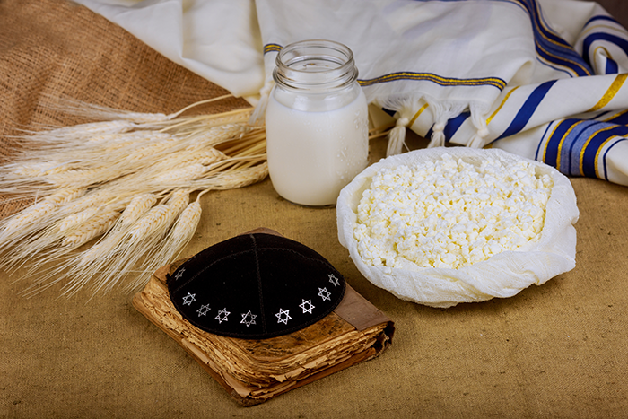 dairy products on wheat field table torah symbols