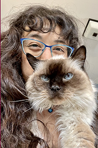 an image of Emme Goldhardt and her cat