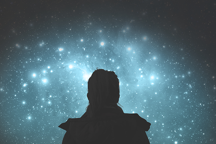 an image of a person staring at the stars in the sky