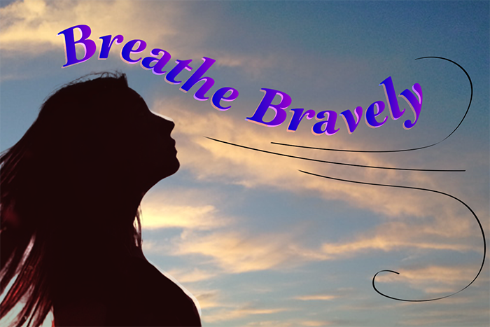 An image of a woman's silhouette standing with the sky and clouds behind her, with the words "Breathe Bravely" in purple