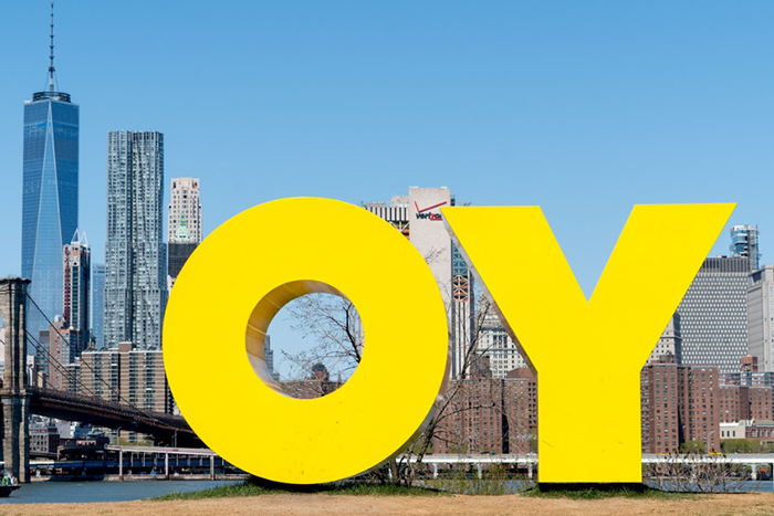 Photo of the word "Oy" in yellow