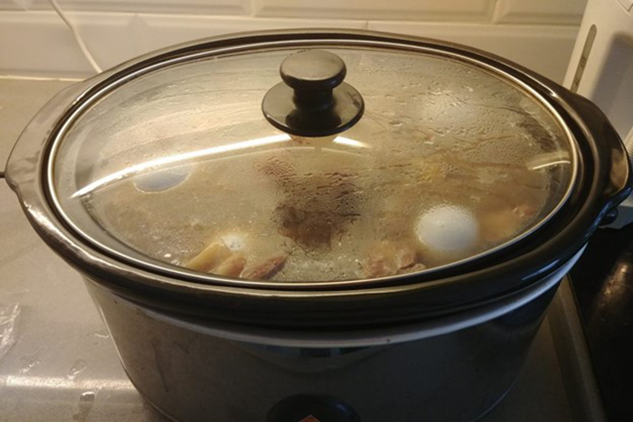 Photo of a crockpot cooking Polish Chulent