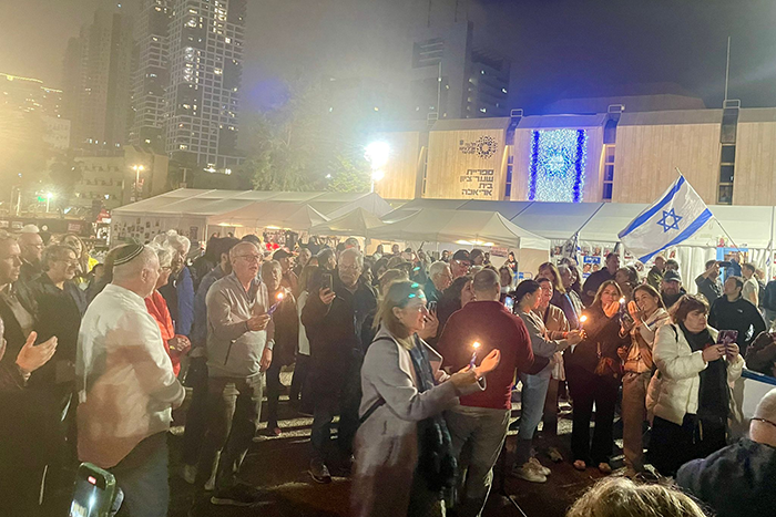 Photo of people in Israel holding candles