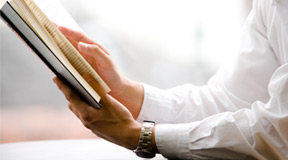 A woman holding a book
