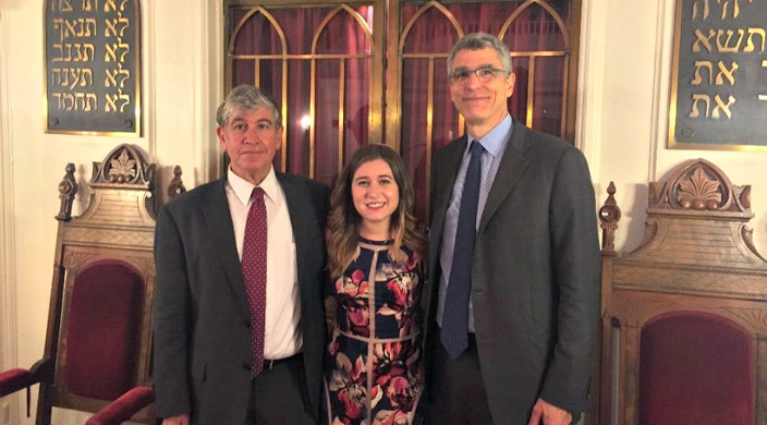 Rabbis Tom Gutherz and Rachel Schmelkin of Congregation Beth Israel in Charlottesville stand in a synagogue sanctuary together with Union for Reform Judaism President Rabbi Rick Jacobs