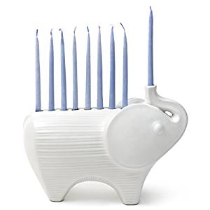 White menorah in the shape of an elephant with blue candles
