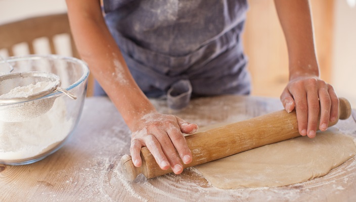 rolling out matzah dough