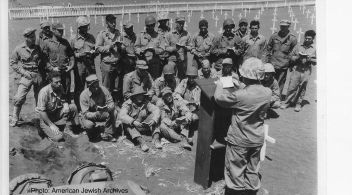Rabbi Roland B. Gittelsohn conducting service. Jewish Memorial Service, Iwo Jima, 21 March 1945.