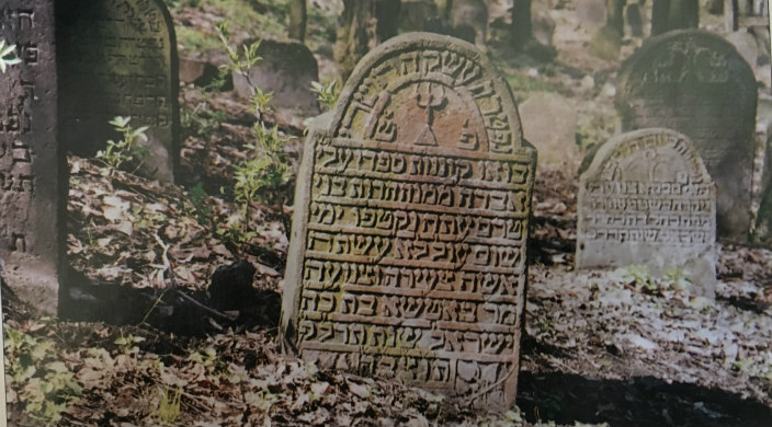 Old gravestone with Hebrew lettering