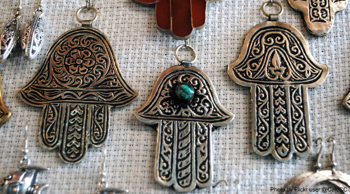 Assorted hamsas in a marketplace