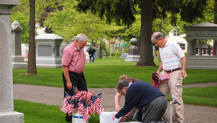 men preparing for memorial day