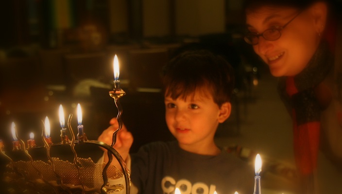 Hanukkah Candle light by Steven M. Isenberg, Temple Emanuel, Lowell, MA 