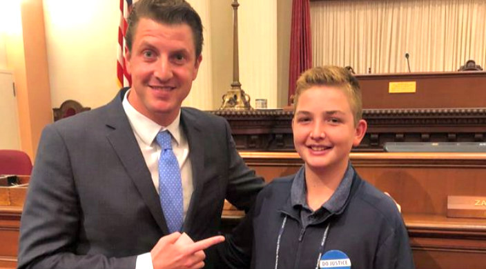 Jonah Bookman poses with his state senator 