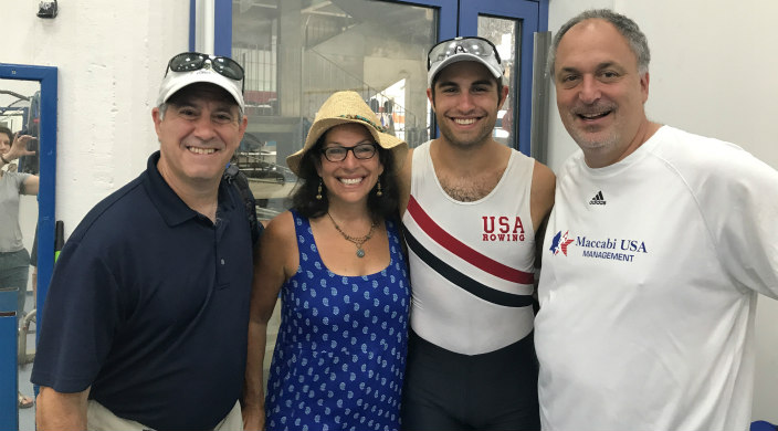 Rabbi Steven Lowenstein with Maccabiah athlete and two other people