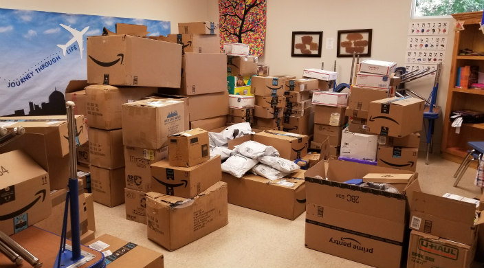 Boxes of donations in support of immigrant children and families
