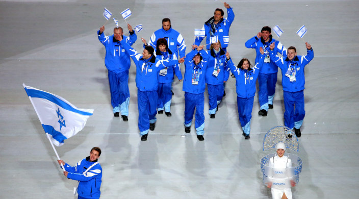 Short track speed skater Vladislav Bykanov leading the Israeli Olympic team at the opening ceremony of the Winter Olympics in Sochi Russia in February of 2014