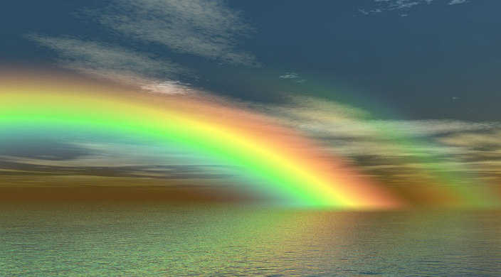 Rainbow over a body of water