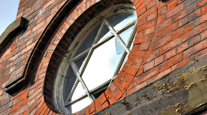 Closeup of a window in the shape of a Star of David 