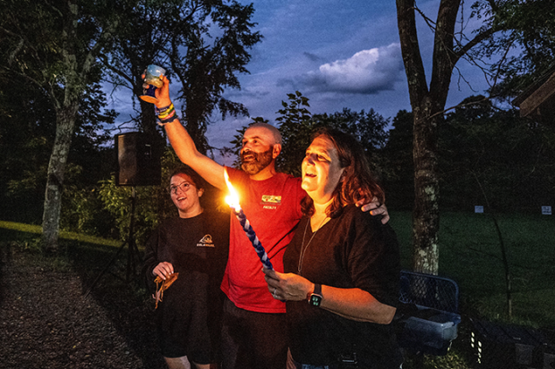 Photo of Rabbi Burkeman and his family at Crane Lake Camp leading Handallah