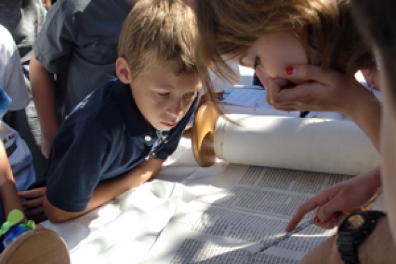 boy reading the Torah