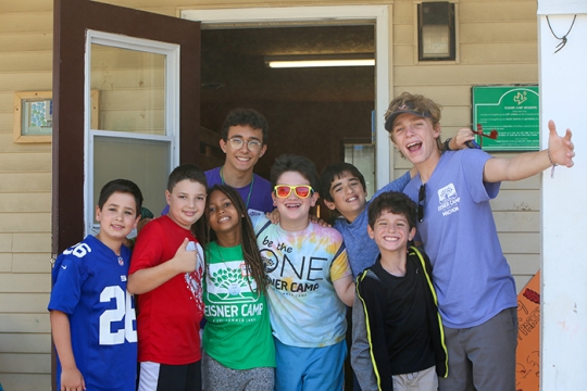 Campers welcoming others at URJ Camp Eisner