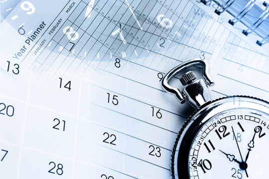 an image of a calendar with white pages and black numbers and a stop watch