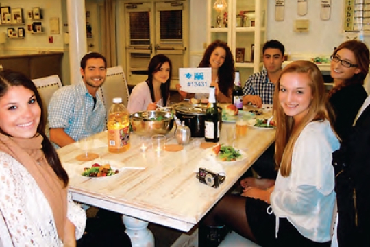 NEXT Shabbat at UC Irvine, November 2011<BR>Photo courtesy of NEXT: A Division of Birthright Israel Foundation Students Sitting at Shabbat Table