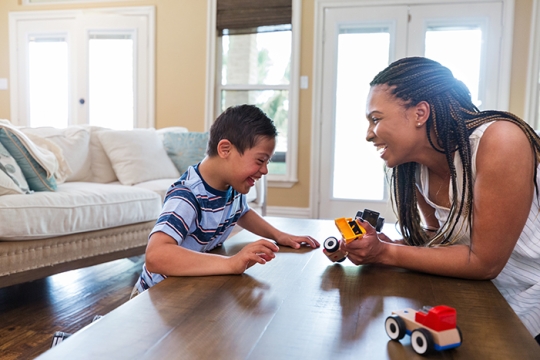 mother and child talking together and smiling