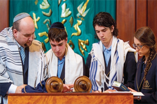 Rabbi Gersh Lazerow instructs pre-b'nai mitzvah students<BR>at Temple Beth Israel. Rabbi Gersh Lazerow instructs pre-b'nai mitzvah students at Temple Beth Israel