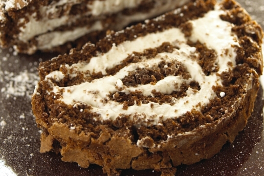 Rolled chocolate cake with cream filling