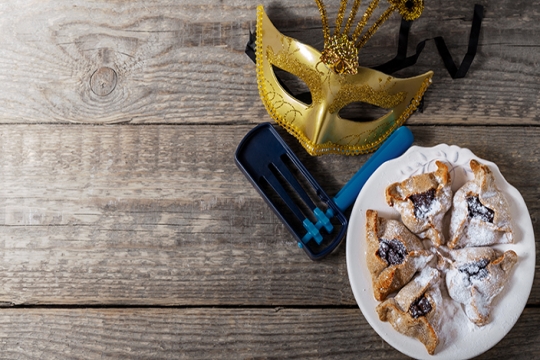 Purim grogger, mask, hamantaschen