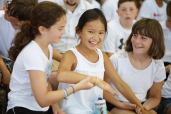 Children wearing white during Shabbat at Jewish Summer Camp