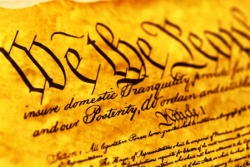Closeup of the US Constitution beginning with We the People