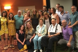 Betty Roswell and her husband Arthur surrounded by Roswell Klal Yisrael Fellows 