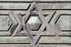 Photo of a star of david etched in stone