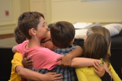 A group of second graders say goodbye during a Yom Kippur activity for the Jewish High Holidays
