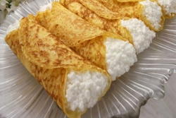 Cheese blintzes on a tray/platter