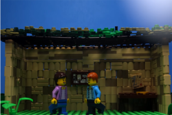 Two lego people in a lego sukkah