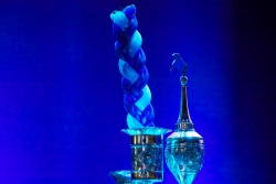 Havdallah candle and silver spice set against a blue lit background