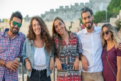 Five NFTY in Israel leaders, two young men and three young women, all smiling 