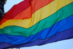 Closeup of the rainbow colors on a pride flag