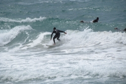 Two surfers in the Mediterranean in Israel