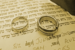 Ketubah, or wedding contract, with signatures and wedding bands